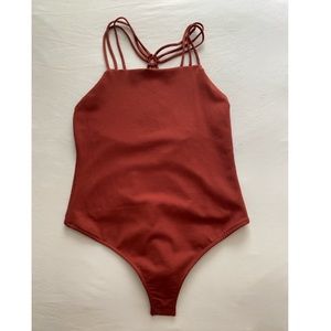 Dark red Lulus body suit with strappy backing NEVER WORN STILL HAS TAGS